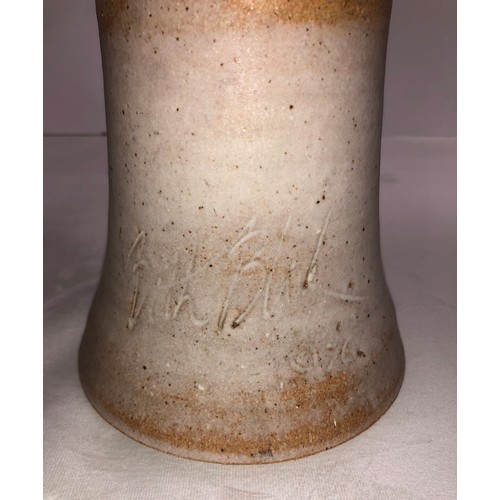 6059 - A tall earthenware Vase, 37cm high, another similar vase, 36.5cm high, a blue and silver striped vas... 