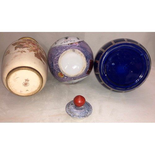 6059 - A tall earthenware Vase, 37cm high, another similar vase, 36.5cm high, a blue and silver striped vas... 