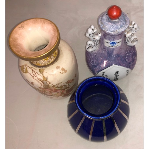 6059 - A tall earthenware Vase, 37cm high, another similar vase, 36.5cm high, a blue and silver striped vas... 