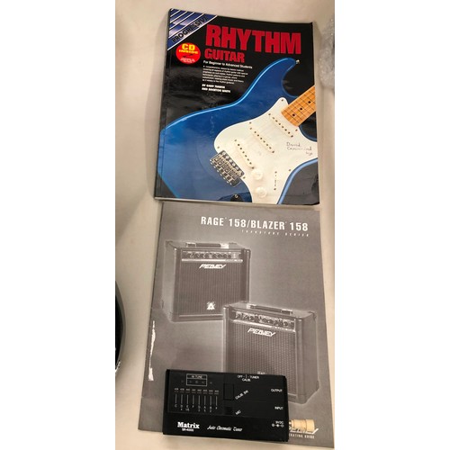 6060 - A Peavey electric guitar no. I 1093755 with a Matrix SR-4000 Auto Chromatic tuner, cables, zipped ca... 