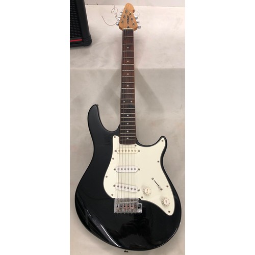 6060 - A Peavey electric guitar no. I 1093755 with a Matrix SR-4000 Auto Chromatic tuner, cables, zipped ca... 
