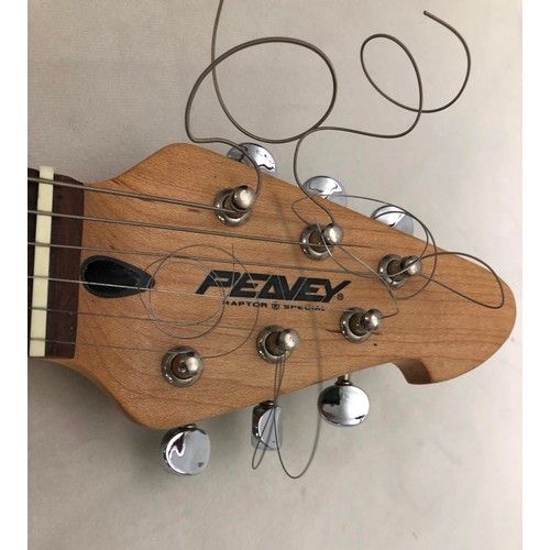 6060 - A Peavey electric guitar no. I 1093755 with a Matrix SR-4000 Auto Chromatic tuner, cables, zipped ca... 