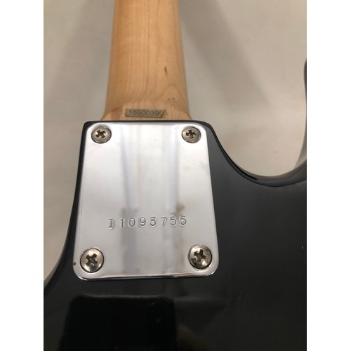 6060 - A Peavey electric guitar no. I 1093755 with a Matrix SR-4000 Auto Chromatic tuner, cables, zipped ca... 