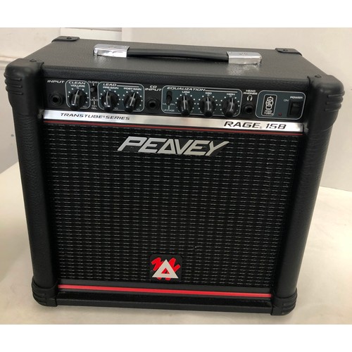 6060 - A Peavey electric guitar no. I 1093755 with a Matrix SR-4000 Auto Chromatic tuner, cables, zipped ca... 