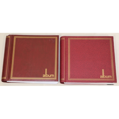 605 - 2 large albums containing vintage postcards, 