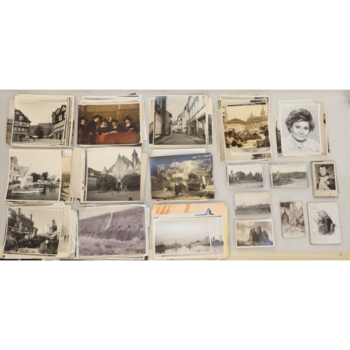 631 - A quantity of various postcards and black and white photographs etc.