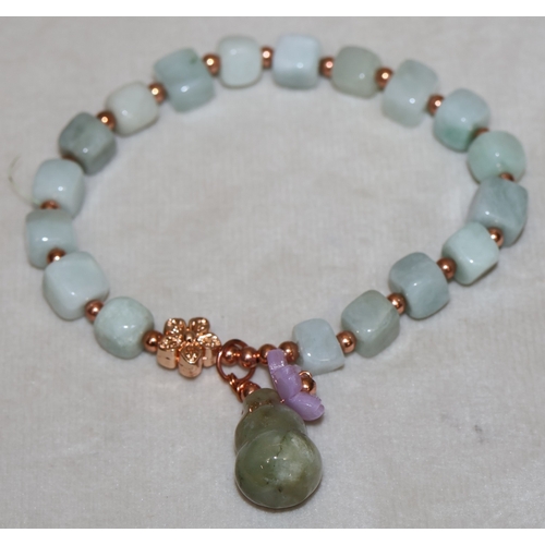 425 - A square jade style hardstone expanding bead bracelet with single drop