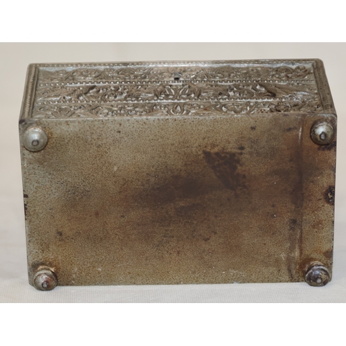 618 - A metal dome topped trinket box casket, hinged lid with allover raised figure, bird, animal and scro... 