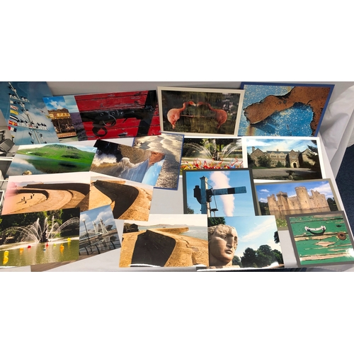 6136 - A portfolio of black and white and coloured photographs