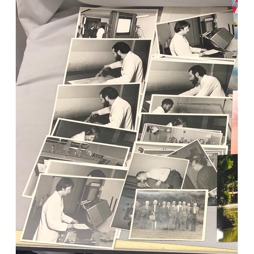 6136 - A portfolio of black and white and coloured photographs