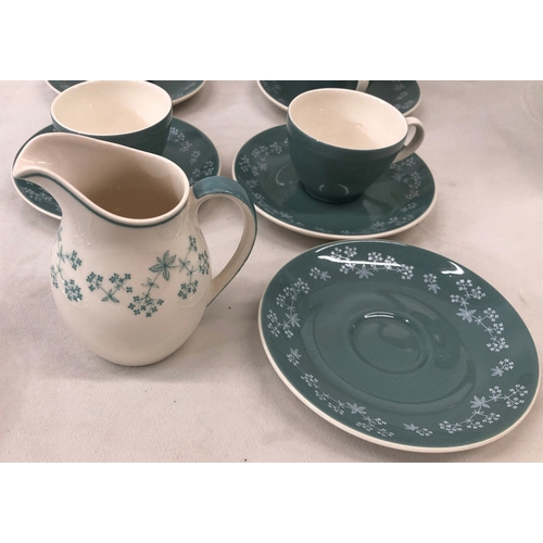 7016 - A Royal Doulton Queenslace pattern part coffee set, 1 coffee pot, 1 jug, 4 cups, 6 saucers and a Cau... 