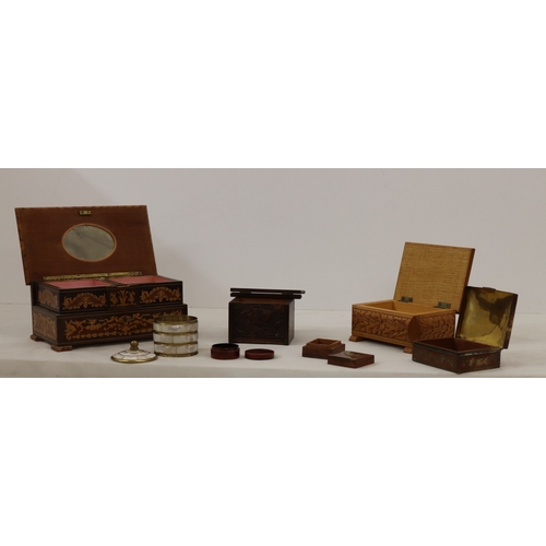 7061 - A wooden musical jewellery box 24cm wide, 12.5cm deep, 11cm high and various other smaller boxes.