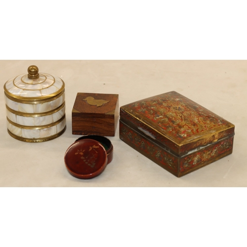 7061 - A wooden musical jewellery box 24cm wide, 12.5cm deep, 11cm high and various other smaller boxes.