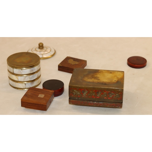 7061 - A wooden musical jewellery box 24cm wide, 12.5cm deep, 11cm high and various other smaller boxes.