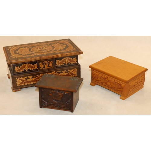 7061 - A wooden musical jewellery box 24cm wide, 12.5cm deep, 11cm high and various other smaller boxes.