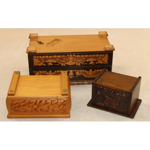 7061 - A wooden musical jewellery box 24cm wide, 12.5cm deep, 11cm high and various other smaller boxes.