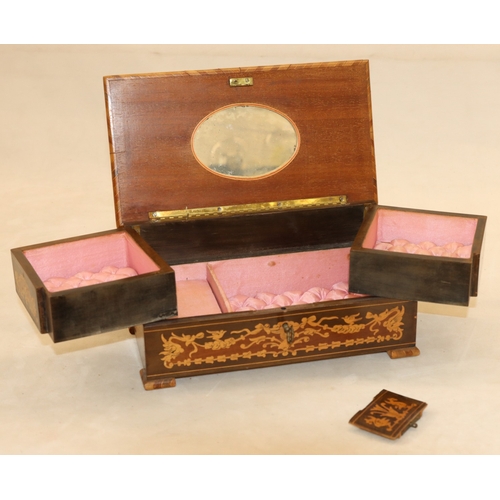 7061 - A wooden musical jewellery box 24cm wide, 12.5cm deep, 11cm high and various other smaller boxes.