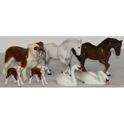 63 - A Beswick CH.Bashford British mascot, 14cm high, 2 Beswick figures of horses, 2 Beswick calves and 2... 