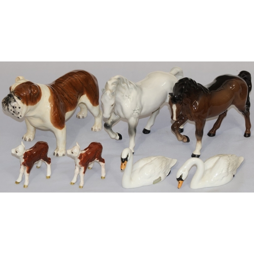 63 - A Beswick CH.Bashford British mascot, 14cm high, 2 Beswick figures of horses, 2 Beswick calves and 2... 