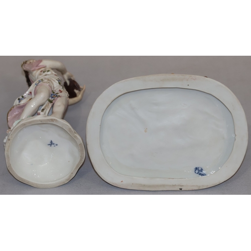 71 - A Naples porcelain group of 2 seated figures with encrusted fruit and leaf decoration, 15.5cm high a... 