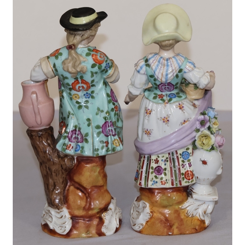 72 - A pair of Continental china figures of farming gentleman and wife holding implements and encrusted f... 