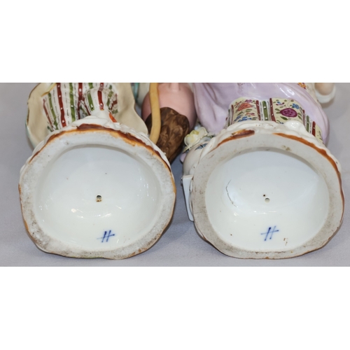 72 - A pair of Continental china figures of farming gentleman and wife holding implements and encrusted f... 