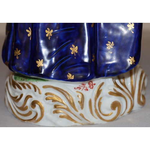 73 - A pair of large Derby style 19th Century porcelain figure of standing gentleman and lady with allove... 