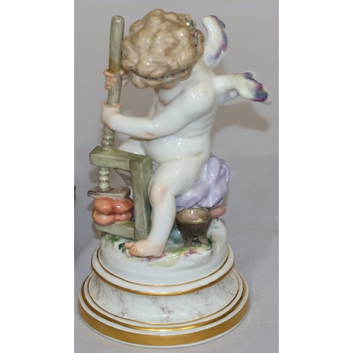 74 - A Meissen porcelain figure of a seated winged cupid pressing 2 hearts together, on round sweeping ba... 