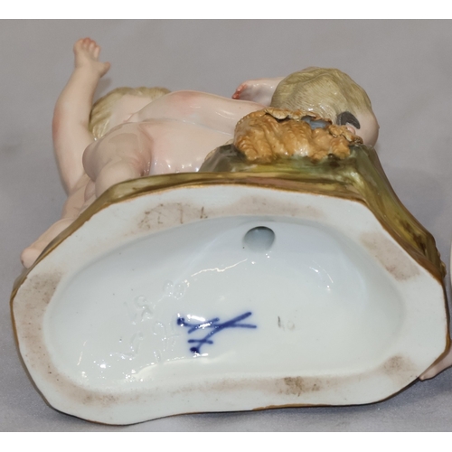 75 - A Meissen group of 3 cupids playing with wheat, 15cm high