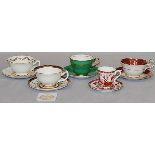 84 - A Crown Staffordshire cup and saucer on white and red ground with floral decoration and 4 various cu... 