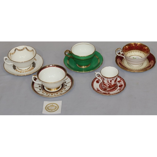 84 - A Crown Staffordshire cup and saucer on white and red ground with floral decoration and 4 various cu... 