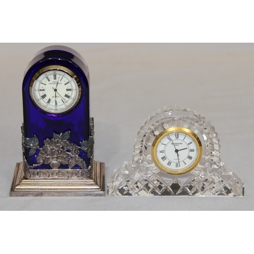88 - A Waterford crystal quartz small timepiece, 10cm wide and a blue glass and silver-plated 