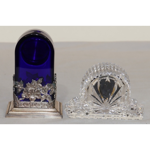 88 - A Waterford crystal quartz small timepiece, 10cm wide and a blue glass and silver-plated 