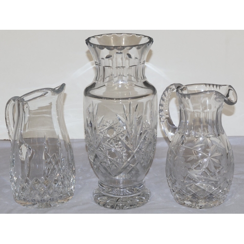 90 - 2 heavy cut glass water jugs, 1 stamped 