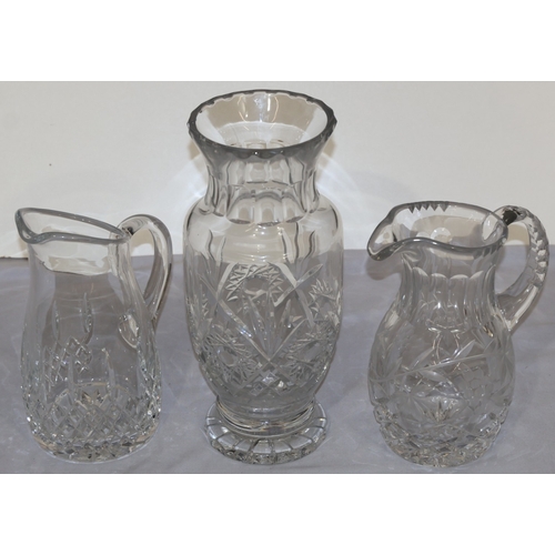 90 - 2 heavy cut glass water jugs, 1 stamped 