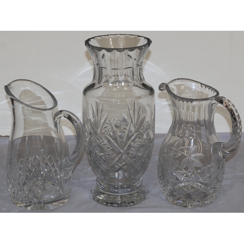 90 - 2 heavy cut glass water jugs, 1 stamped 