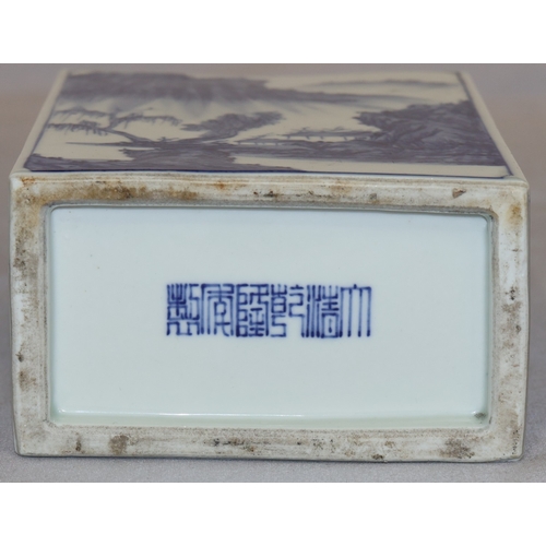 96 - An Oriental rectangular brush pot on blue and white ground with river landscape decoration, 12cm hig... 