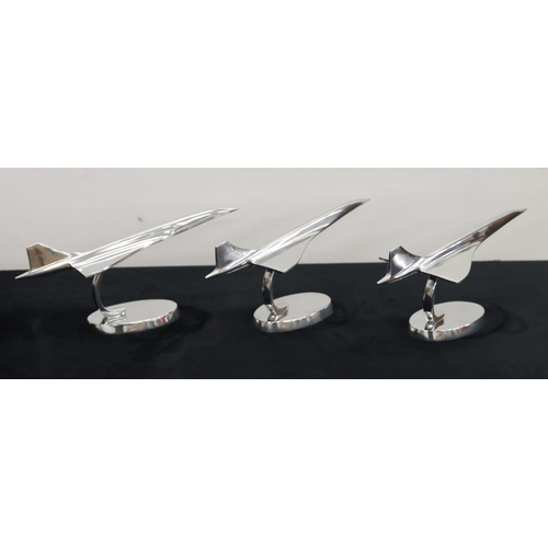A set of 3 modern alloy Concorde models, 32cm long, 13.5cm high.