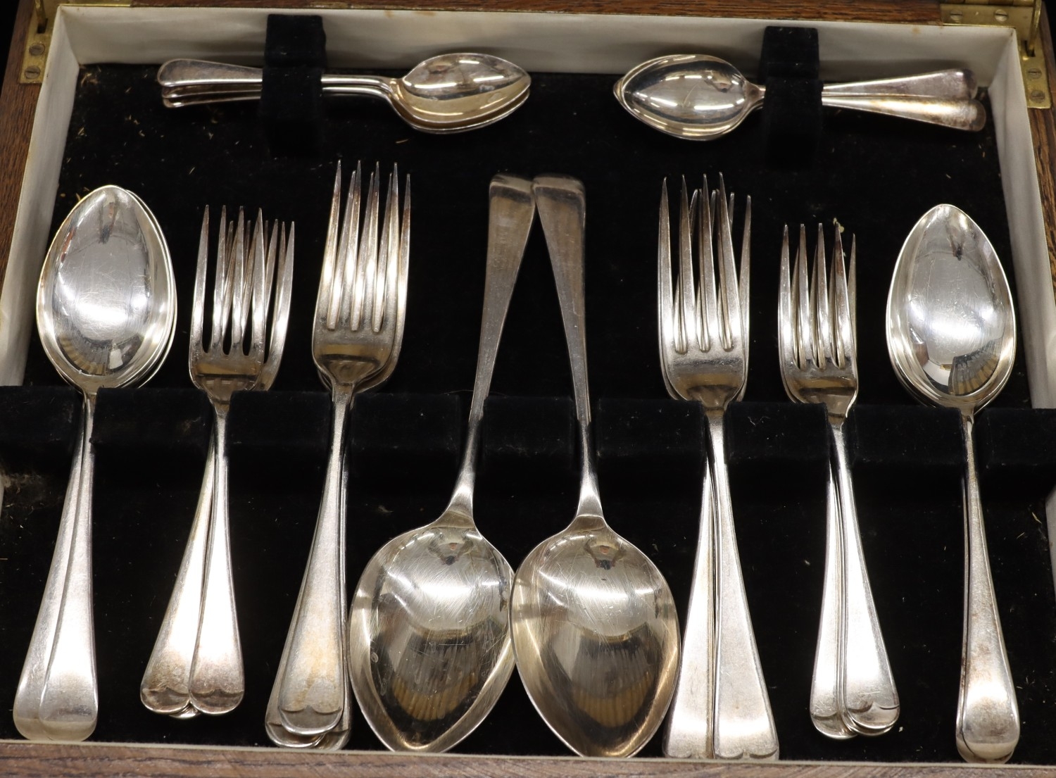 A plated flatware service, cased, 6 large knives, 6 small knives, 6 ...