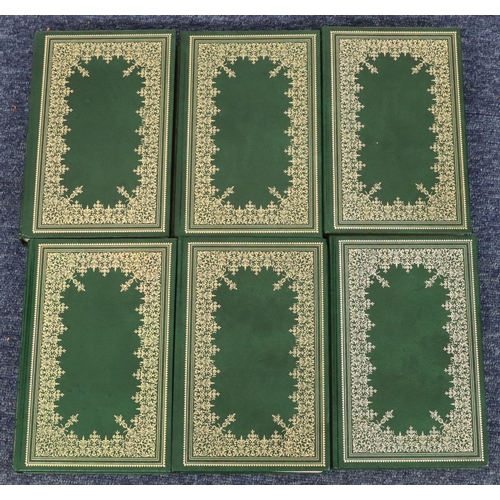 9010 - A set of 24 Guild Publishing books with green faux leather covers and ornate decoration, authors inc... 