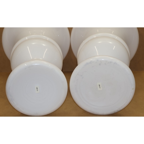 2 - A pair of tall Opaline glass round trumpet shaped vases, on round sweeping bases (minute chip to rim... 