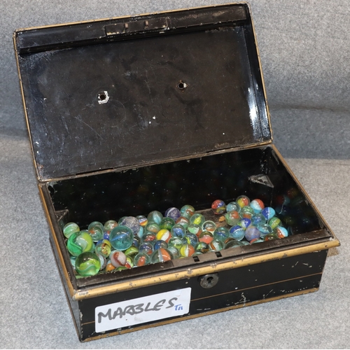 A quantity of various vintage marbles in a vintage cash tin (handle ...