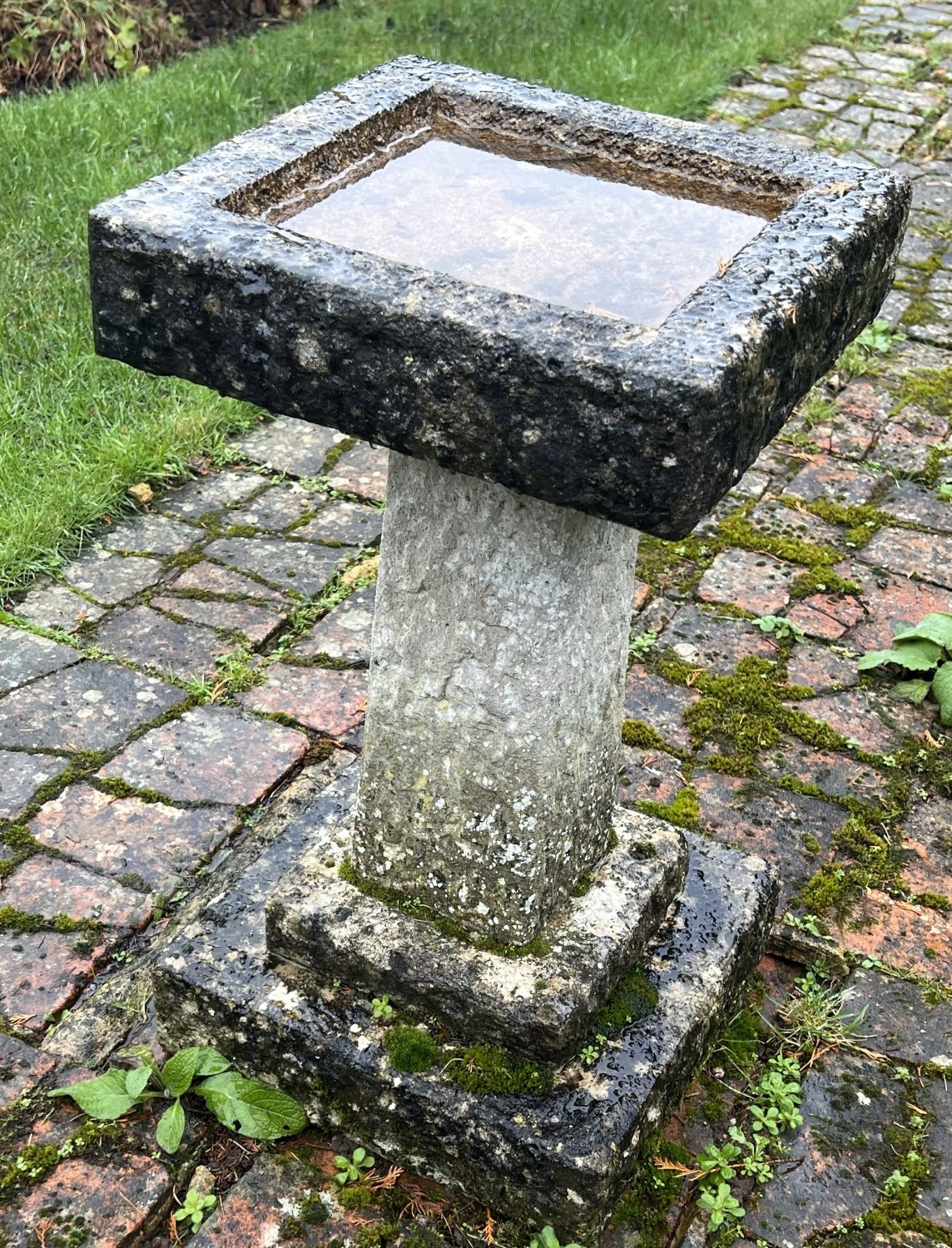 NOT HELD BY PFW. A stone garden bird table, base 35cm x 35cm, 67.5cm ...