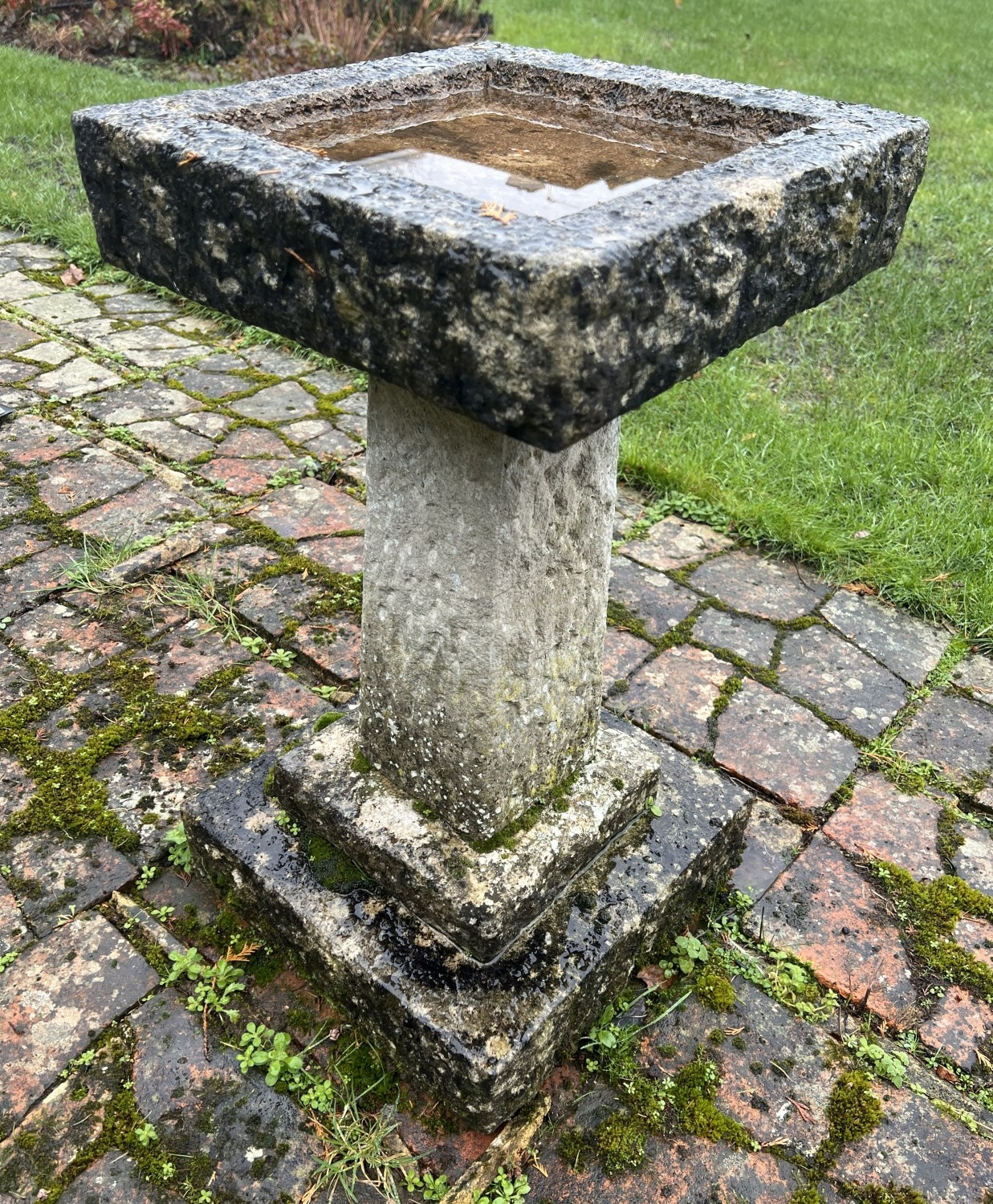 NOT HELD BY PFW. A stone garden bird table, base 35cm x 35cm, 67.5cm ...