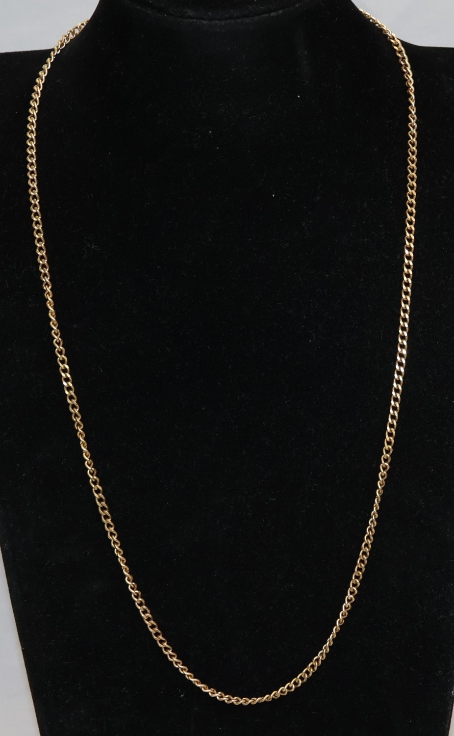 A 9ct flat gold chain, 61cm long, 16.7 grams
