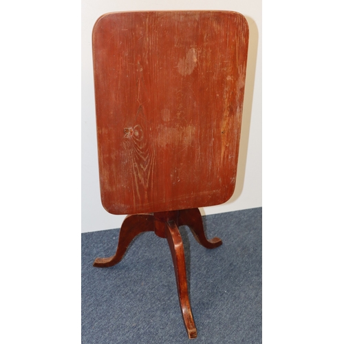 3001 - A small tilt-top table, top 53cm x 37.5cm, 70cm high (top not attached, marks to top and old woodwor... 