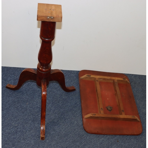 3001 - A small tilt-top table, top 53cm x 37.5cm, 70cm high (top not attached, marks to top and old woodwor... 