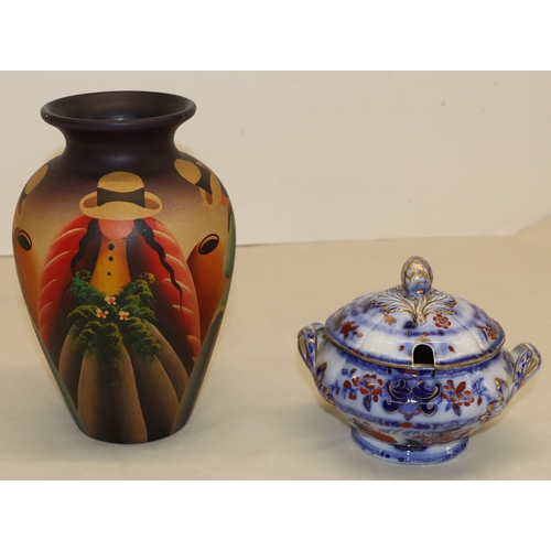 3005 - An earthenware vase, 25.5cm high (small chip to rim) a small lidded tureen, 14cm high and 4 plates. ... 