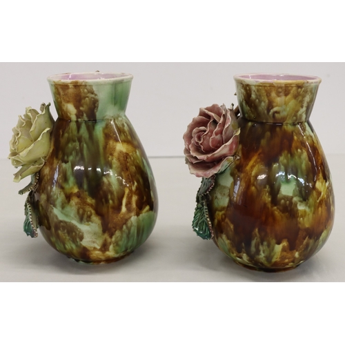 3013 - A pair of Majolica vases, 20cm high. (1 rose petal damaged, 3 leaves damaged and 1 chip to 1 leaf).