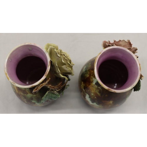 3013 - A pair of Majolica vases, 20cm high. (1 rose petal damaged, 3 leaves damaged and 1 chip to 1 leaf).